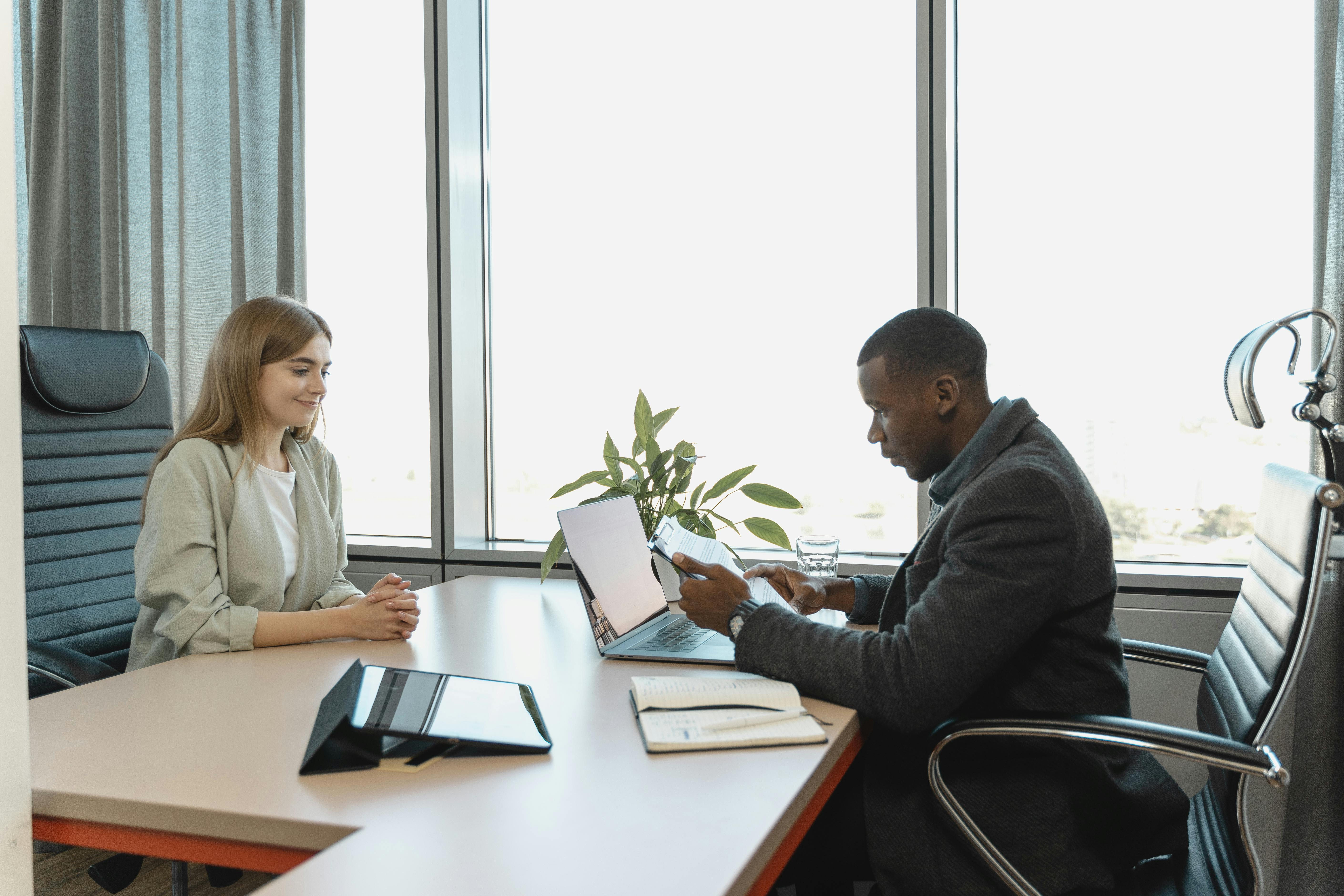 Two people in a meeting