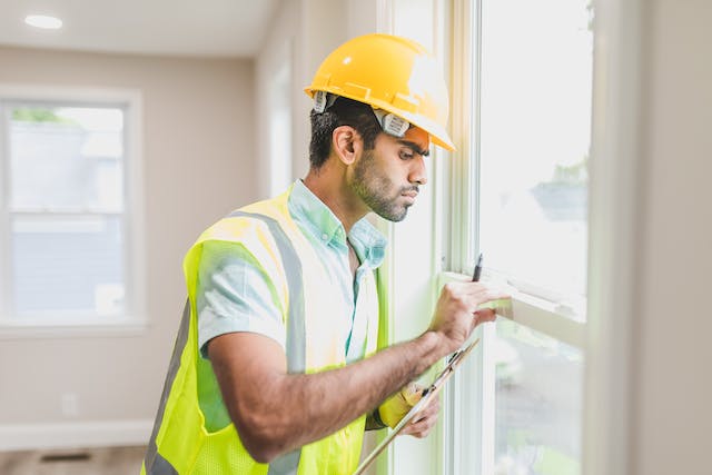 Person performing home inspection